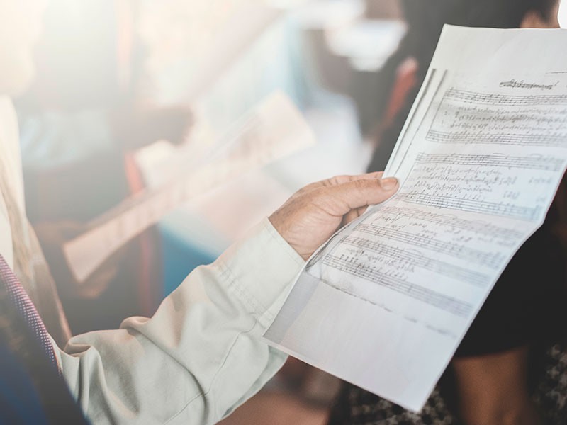 Chorale Are holding a book singing | Adobe Stock