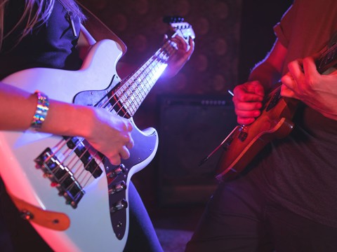 Mid section of male and female guitarist in nightclub | ©WavebreakMediaMicro - stock.adobe.com