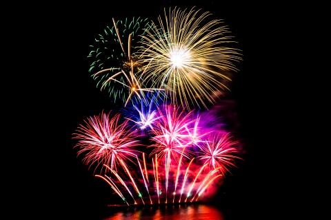 Beautiful fireworks display on black sky | ia